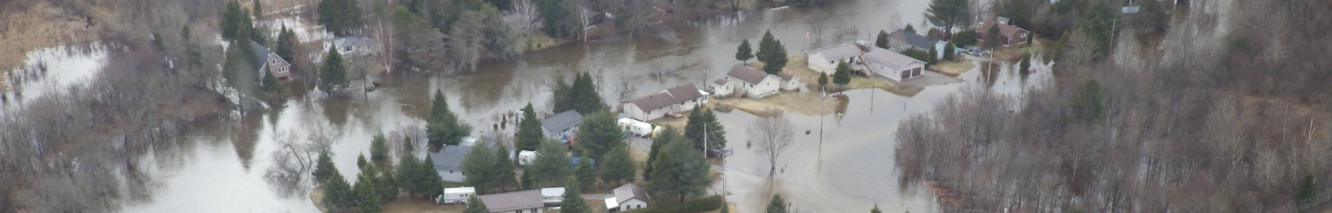 Flooded river and neighbourhood