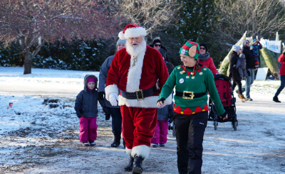 Santa Claus and elves at Christmas at Ken Reid